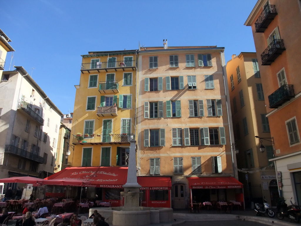 Fountain and houses at the Place Rossetti square, at Vieux-Nice