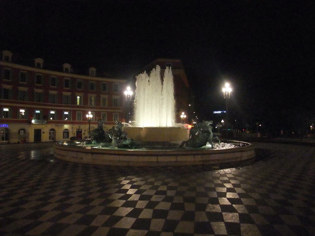 Fontaine du Soleil fountain at Place Masséna square, by night