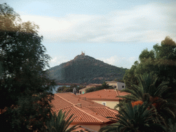 Hill and houses, viewed from the TGV train to Grenoble