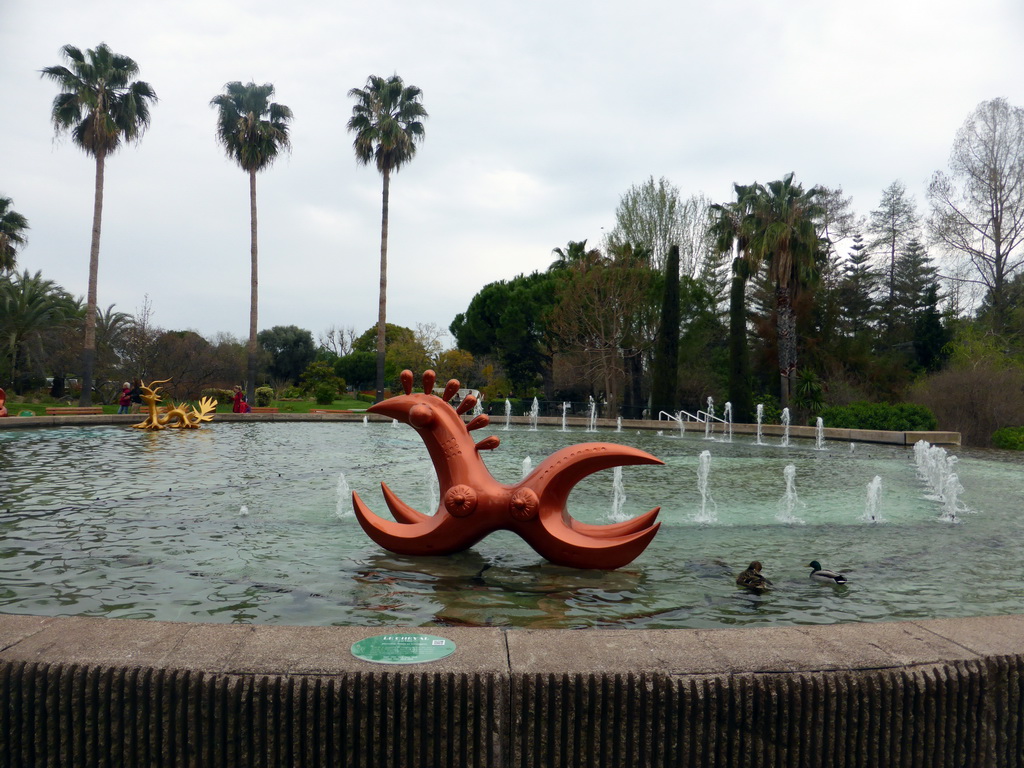 Central Fountain with statues of a horse and a dragon, at the Parc Phoenix zoo