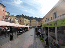 Market stalls and restaurants at the Cours Saleya street, at Vieux-Nice