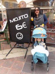 Miaomiao and Max with a Mojito sign in front of a restaurant at the Cours Saleya street, at Vieux-Nice