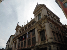 Northwest side of the Nice Opera building at the crossing of the Rue Saint-François de Paule street and the Rue Milton Robbins street, at Vieux-Nice