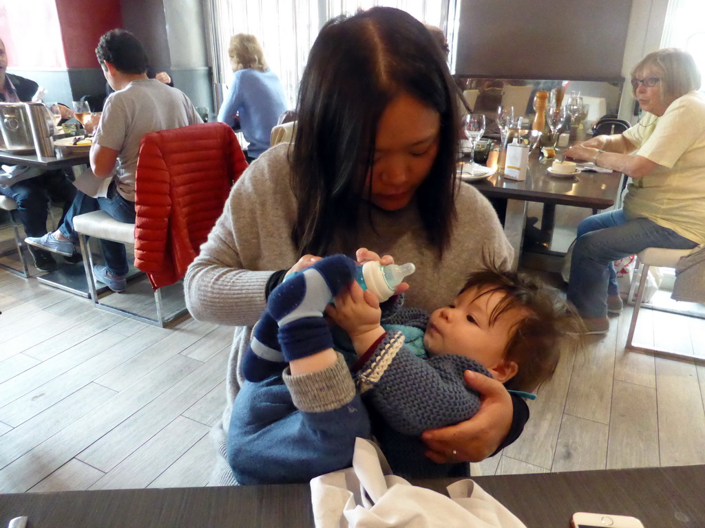 Miaomiao feeding Max at the La Fivola restaurant at the Cours Saleya street, at Vieux-Nice