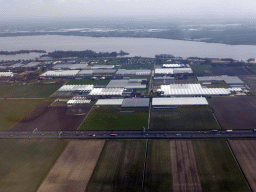 Greenhouses at Rijsenhout and the Westeinderplassen lake, viewed from the airplane to Amsterdam