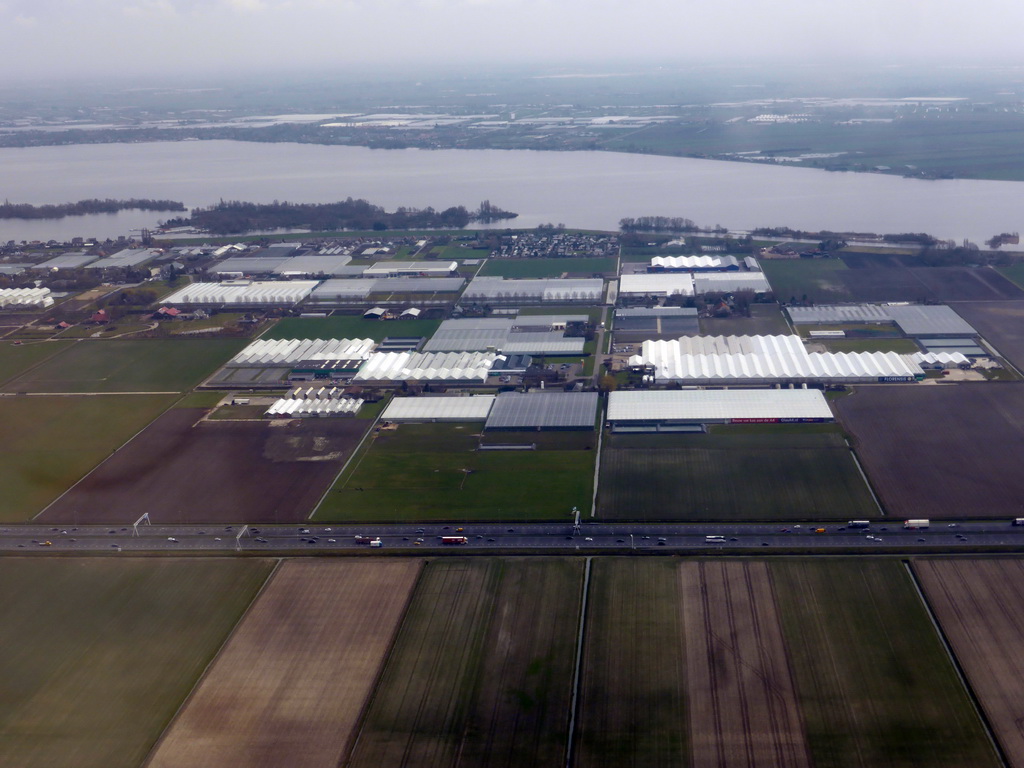 Greenhouses at Rijsenhout and the Westeinderplassen lake, viewed from the airplane to Amsterdam