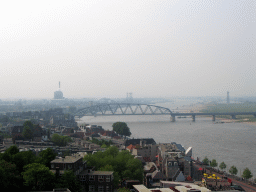 The Waalkade street and the Nijmegen railway bridge over the Waal river, viewed from the replica of the Donjon tower at the Valkhof park