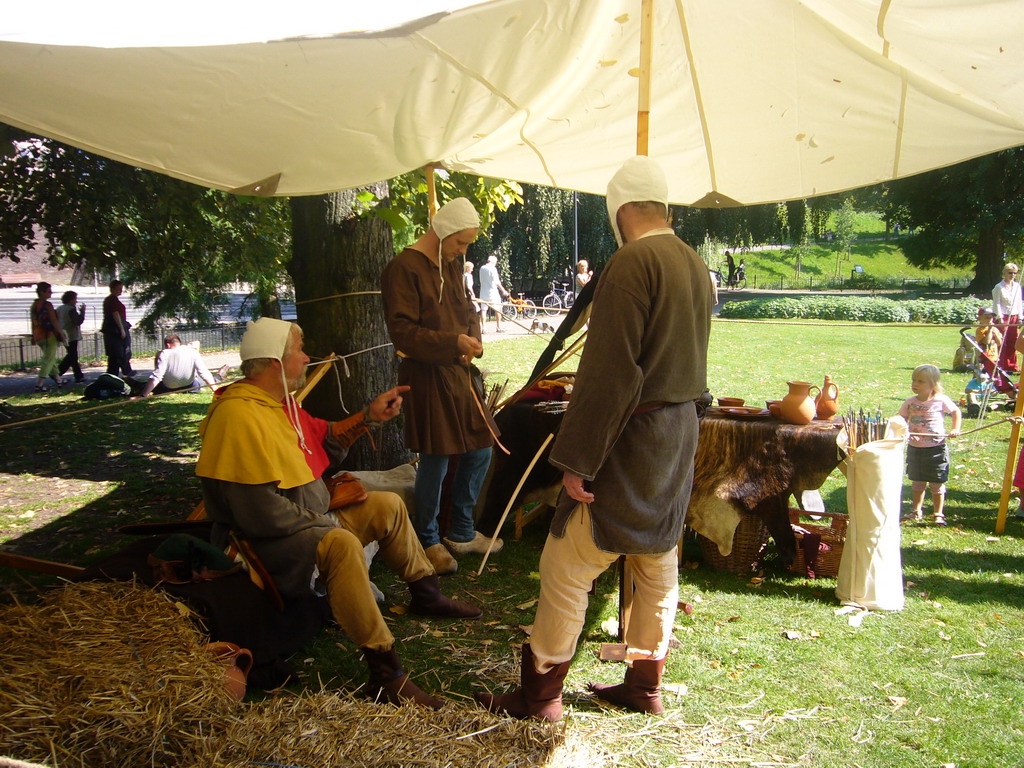 People in medieval clothes at the Kronenburgerpark, during the Gebroeders van Limburg Festival