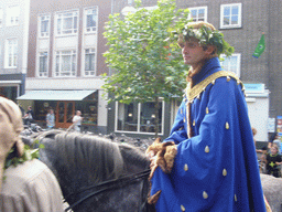 Person in medieval clothes on a horse at the Ganzenheuvel square, during the Gebroeders van Limburg Festival