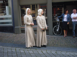 People in medieval clothes at the Houtstraat street, during the Gebroeders van Limburg Festival