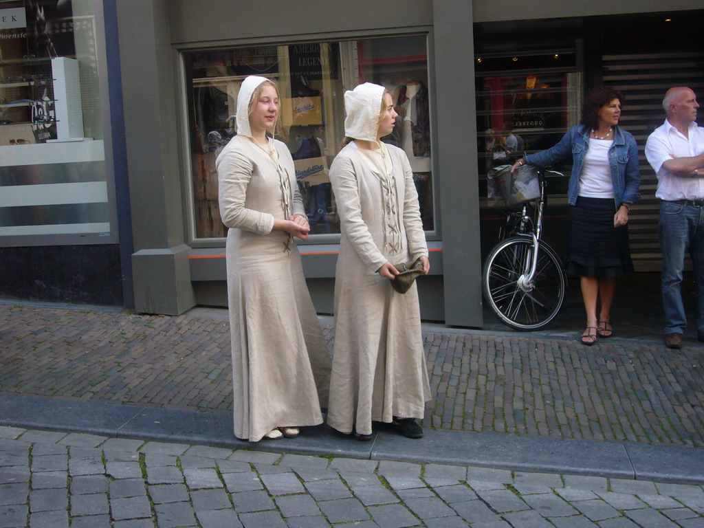 People in medieval clothes at the Houtstraat street, during the Gebroeders van Limburg Festival