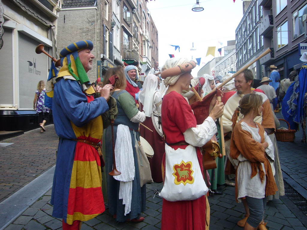 People dressed as medieval musicians at the Houtstraat street, during the Gebroeders van Limburg Festival