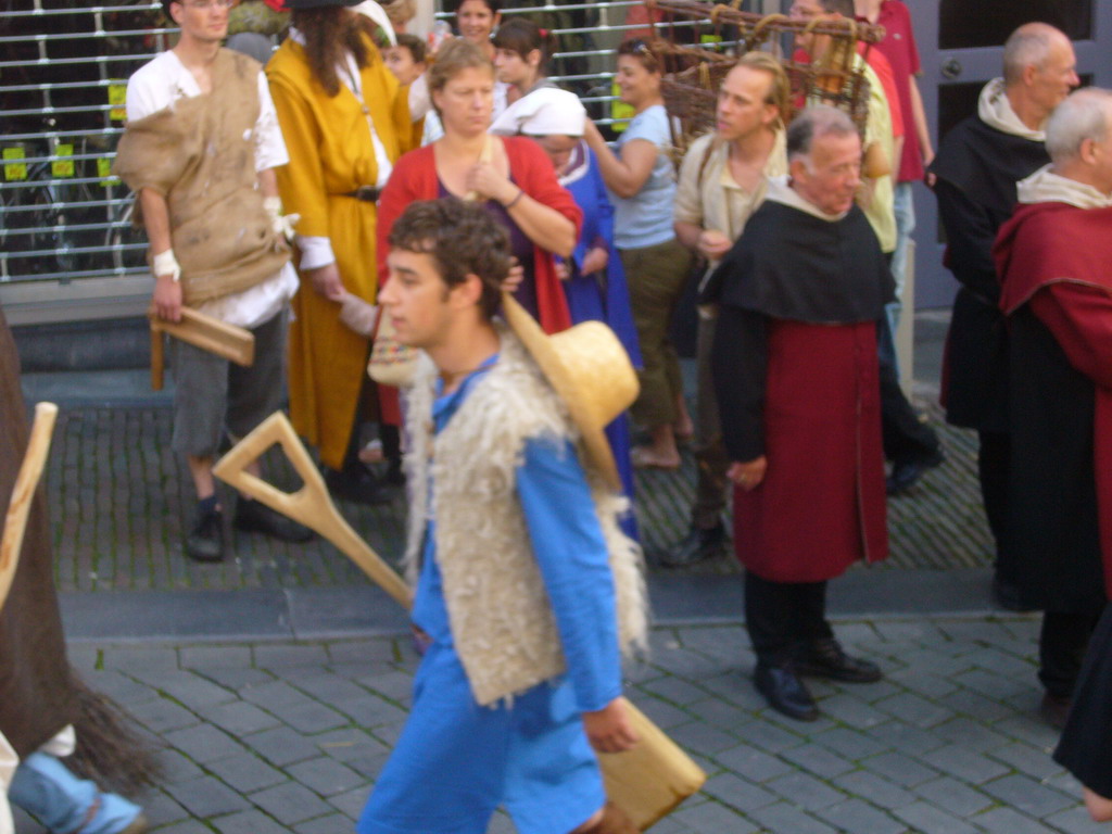 People in medieval clothes at the Houtstraat street, during the Gebroeders van Limburg Festival