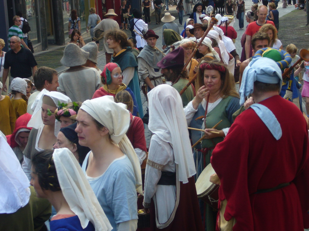 People in medieval clothes at the Houtstraat street, during the Gebroeders van Limburg Festival