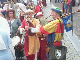 People dressed as medieval musicians at the Houtstraat street, during the Gebroeders van Limburg Festival