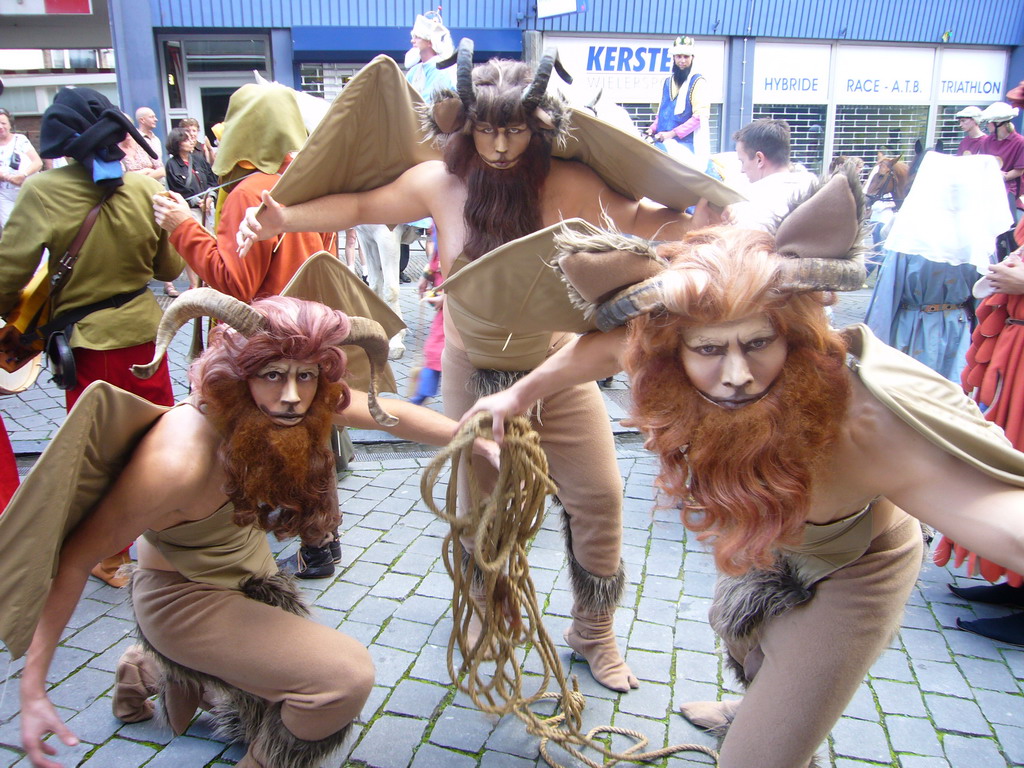People dressed as mythological creatures at the Houtstraat street, during the Gebroeders van Limburg Festival