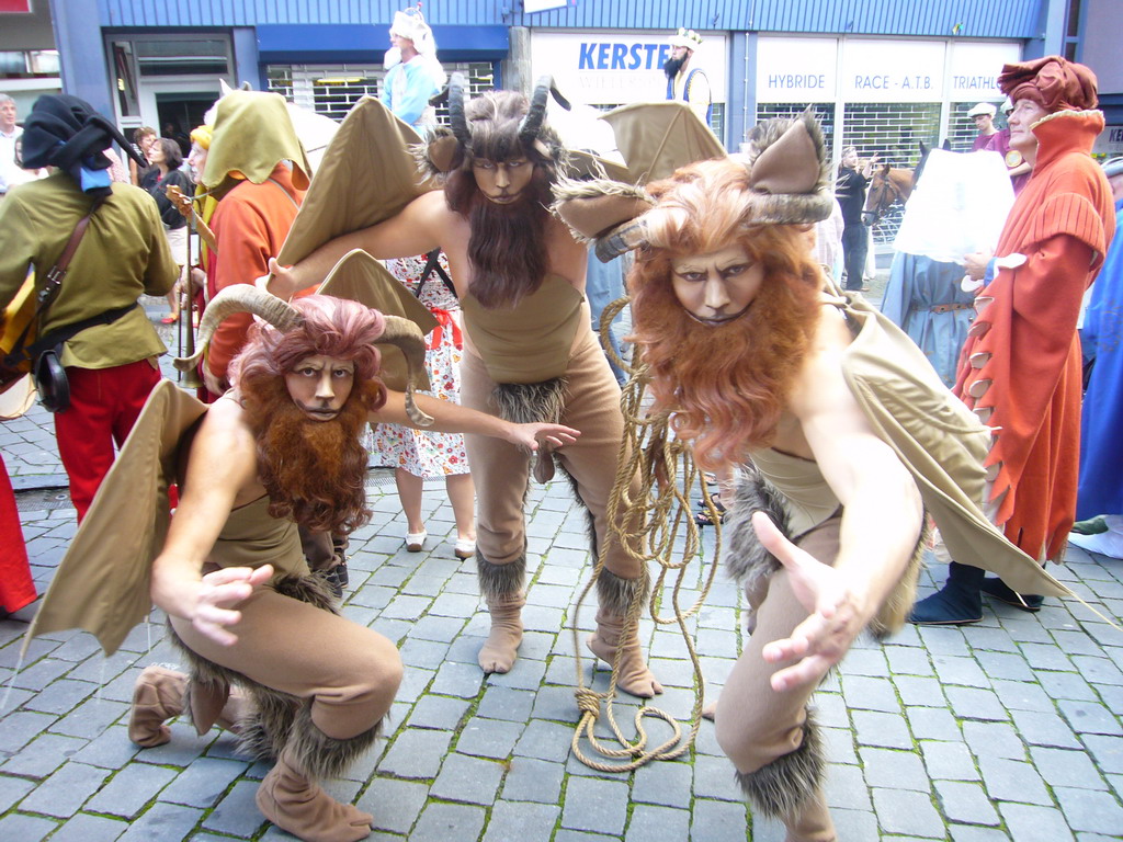 People dressed as mythological creatures at the Houtstraat street, during the Gebroeders van Limburg Festival