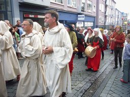 People in medieval clothes at the Houtstraat street, during the Gebroeders van Limburg Festival