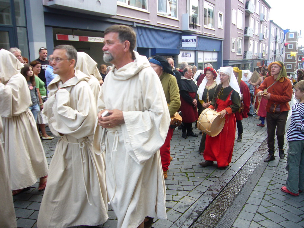 People in medieval clothes at the Houtstraat street, during the Gebroeders van Limburg Festival