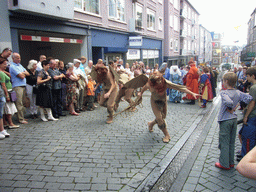 People dressed as mythological creatures at the Houtstraat street, during the Gebroeders van Limburg Festival