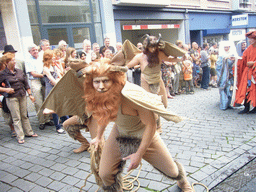 People dressed as mythological creatures at the Houtstraat street, during the Gebroeders van Limburg Festival