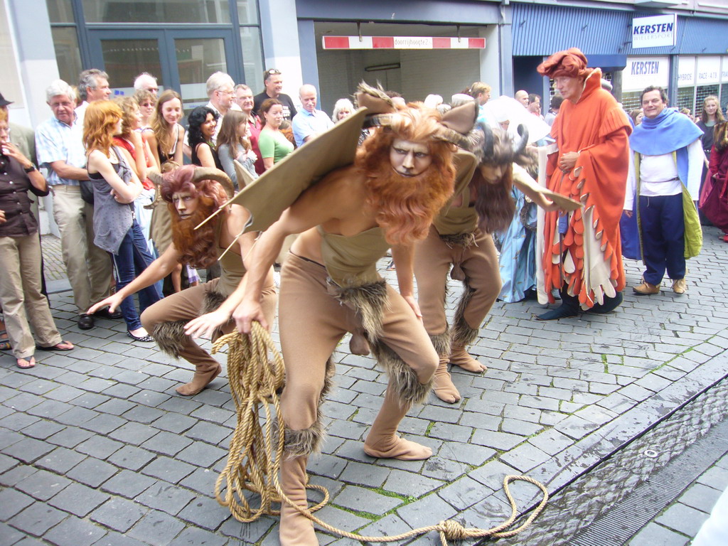 People dressed as mythological creatures at the Houtstraat street, during the Gebroeders van Limburg Festival