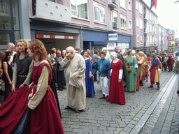 People in medieval clothes at the Houtstraat street, during the Gebroeders van Limburg Festival