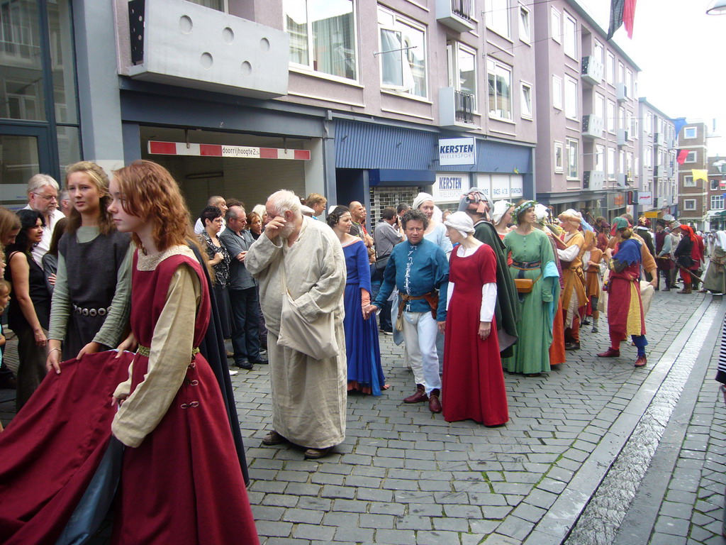 People in medieval clothes at the Houtstraat street, during the Gebroeders van Limburg Festival