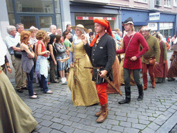 People in medieval clothes at the Houtstraat street, during the Gebroeders van Limburg Festival