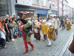 People in medieval clothes at the Houtstraat street, during the Gebroeders van Limburg Festival