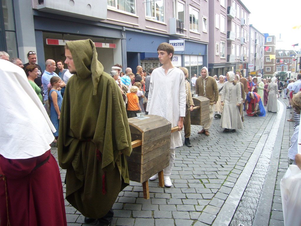 People in medieval clothes at the Houtstraat street, during the Gebroeders van Limburg Festival