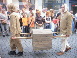 People in medieval clothes at the Houtstraat street, during the Gebroeders van Limburg Festival