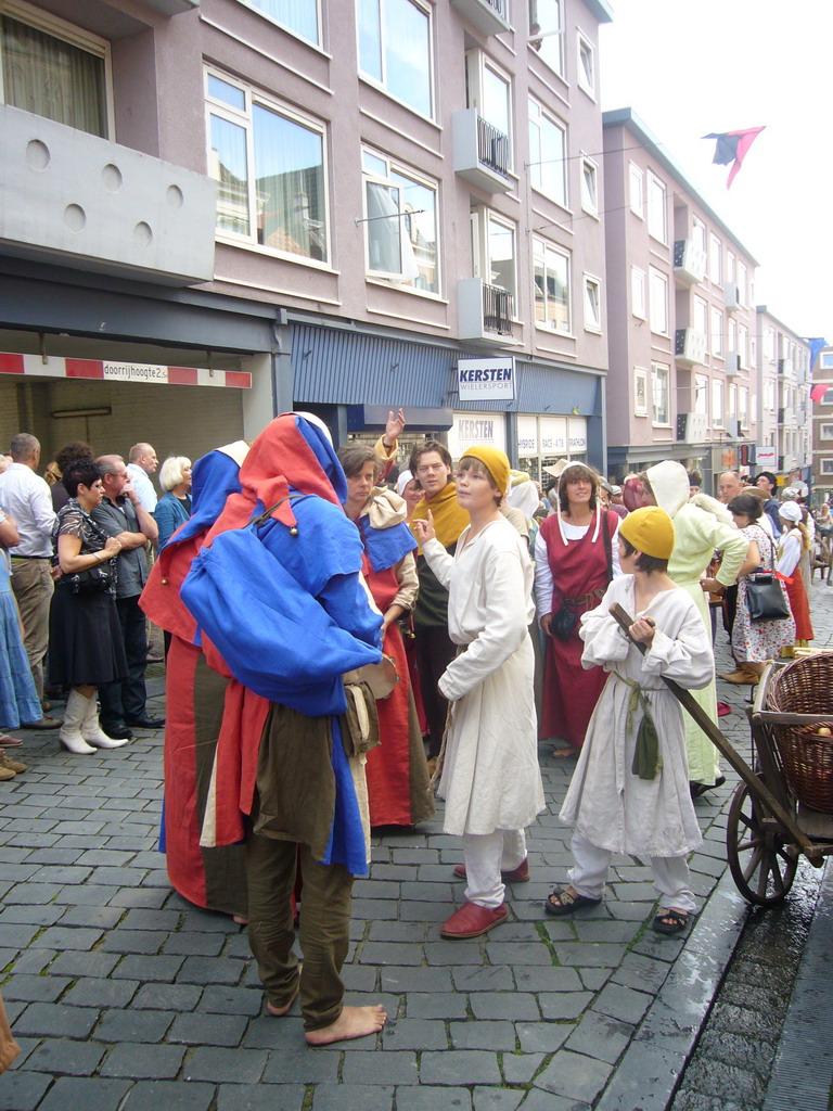 People in medieval clothes at the Houtstraat street, during the Gebroeders van Limburg Festival