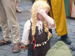 Child in medieval clothes at the Houtstraat street, during the Gebroeders van Limburg Festival