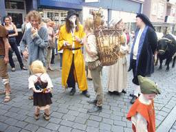 People in medieval clothes at the Houtstraat street, during the Gebroeders van Limburg Festival