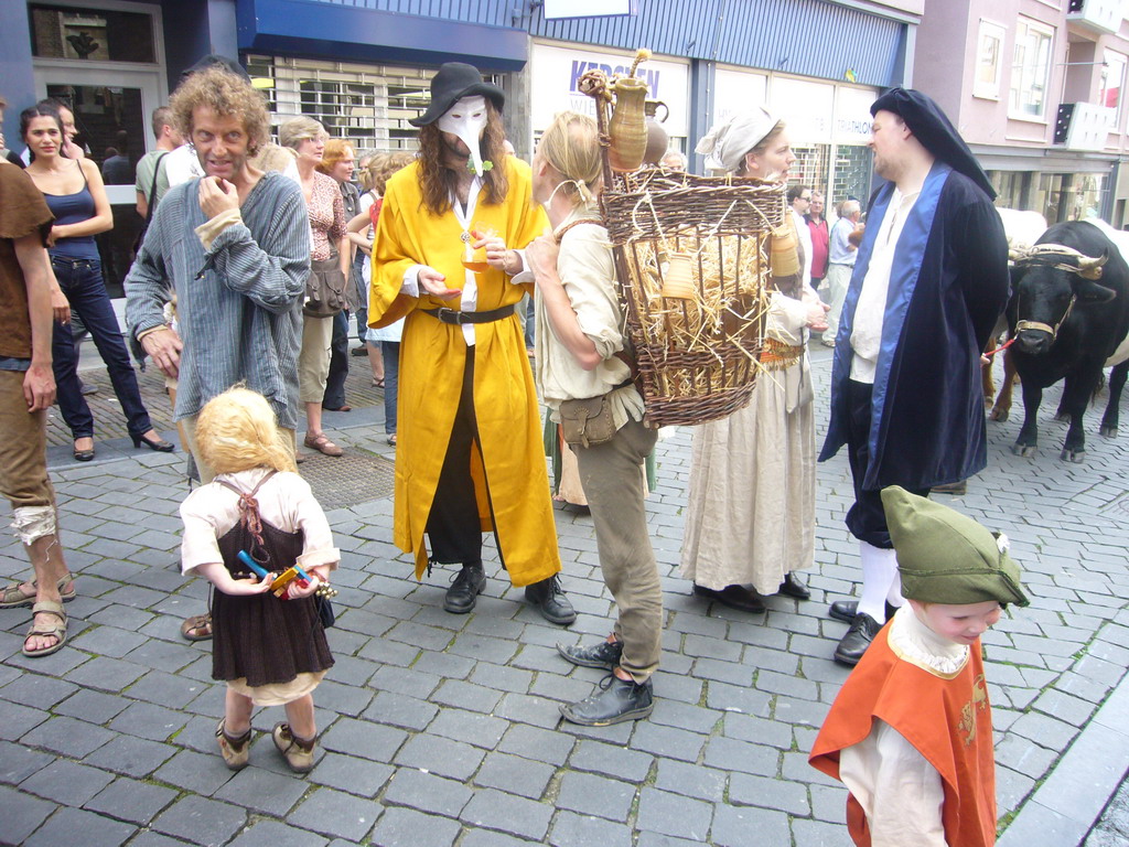 People in medieval clothes at the Houtstraat street, during the Gebroeders van Limburg Festival