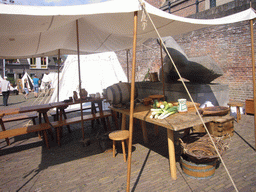 Table with food in front of the Sint Stevenskerk church at the Sint Stevenskerkhof square, during the Gebroeders van Limburg Festival