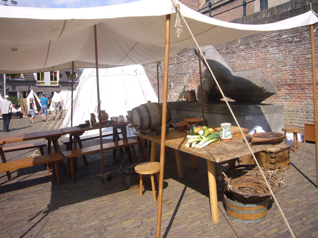 Table with food in front of the Sint Stevenskerk church at the Sint Stevenskerkhof square, during the Gebroeders van Limburg Festival