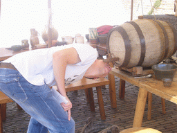 Tim drinking from a tap at the Sint Stevenskerkhof square, during the Gebroeders van Limburg Festival