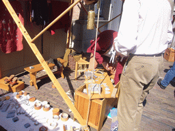 Person in medieval clothes making jewellery at the Sint Stevenskerkhof square, during the Gebroeders van Limburg Festival