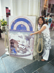 Miaomiao with a painting in the Sint Stevenskerk church