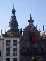 The facade of the Kerkboog arch and the tower of the Sint Stevenskerk church, viewed from the Grote Markt square