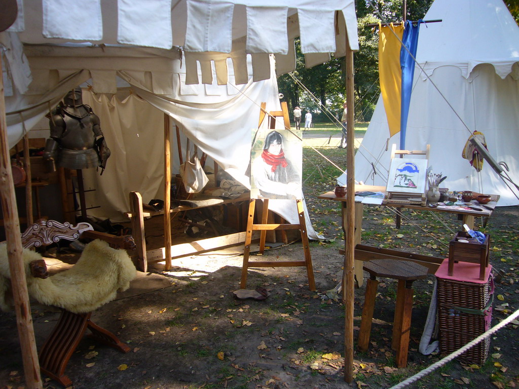 Tents with medieval armour and paintings at the Valkhof park, during the Gebroeders van Limburg Festival