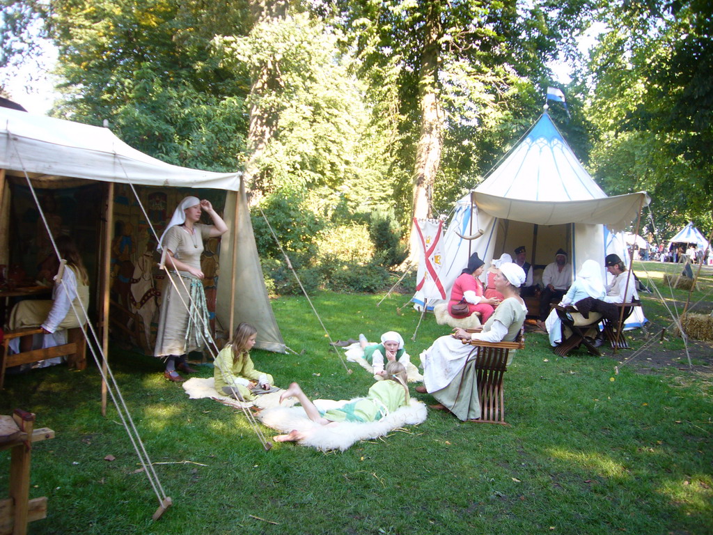 Tents and people in medieval clothes at the Valkhof park, during the Gebroeders van Limburg Festival