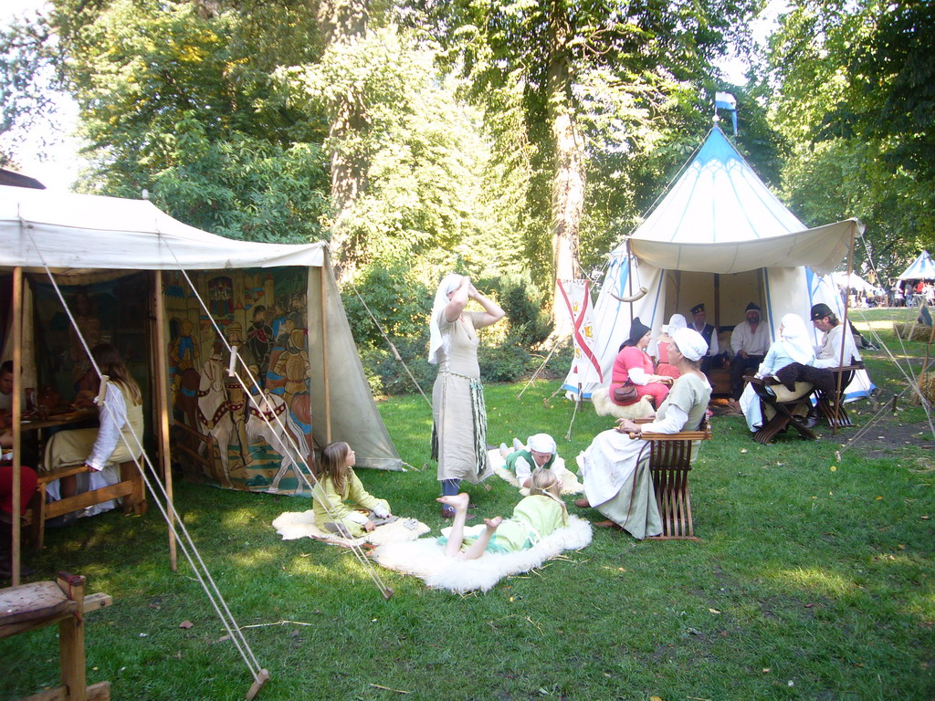 Tents and people in medieval clothes at the Valkhof park, during the Gebroeders van Limburg Festival