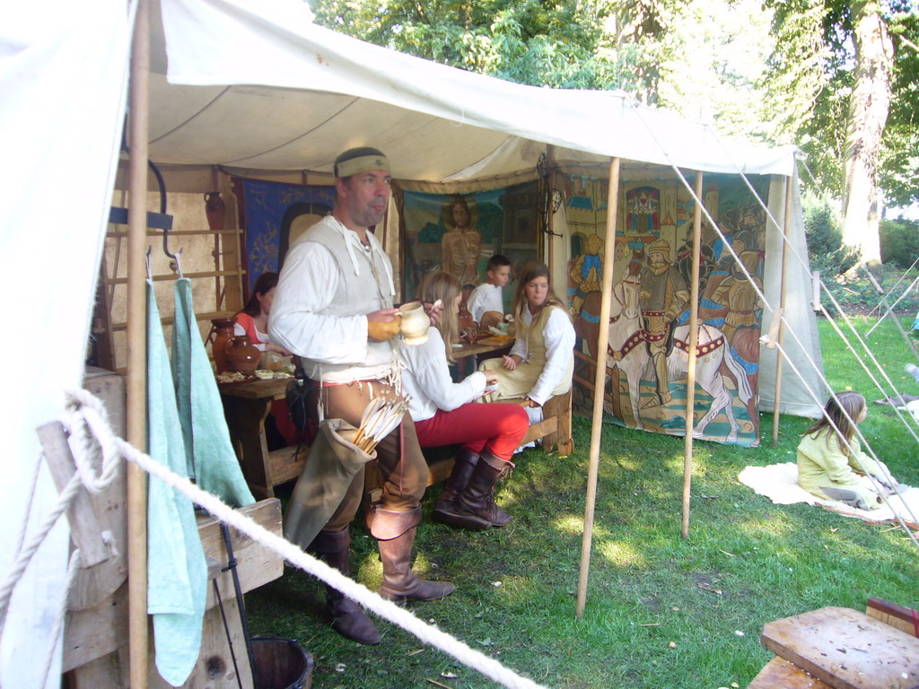 Tents and people in medieval clothes at the Valkhof park, during the Gebroeders van Limburg Festival