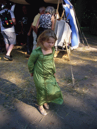 Child in medieval clothes at the Valkhof park, during the Gebroeders van Limburg Festival