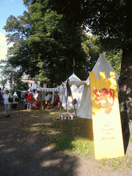 Tents and sign at the Valkhof park, during the Gebroeders van Limburg Festival
