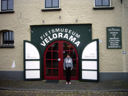 Miaomiao in front of the Velorama musuem at the Waalkade street