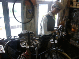 Statue of a bicycle repairman at the Velorama museum